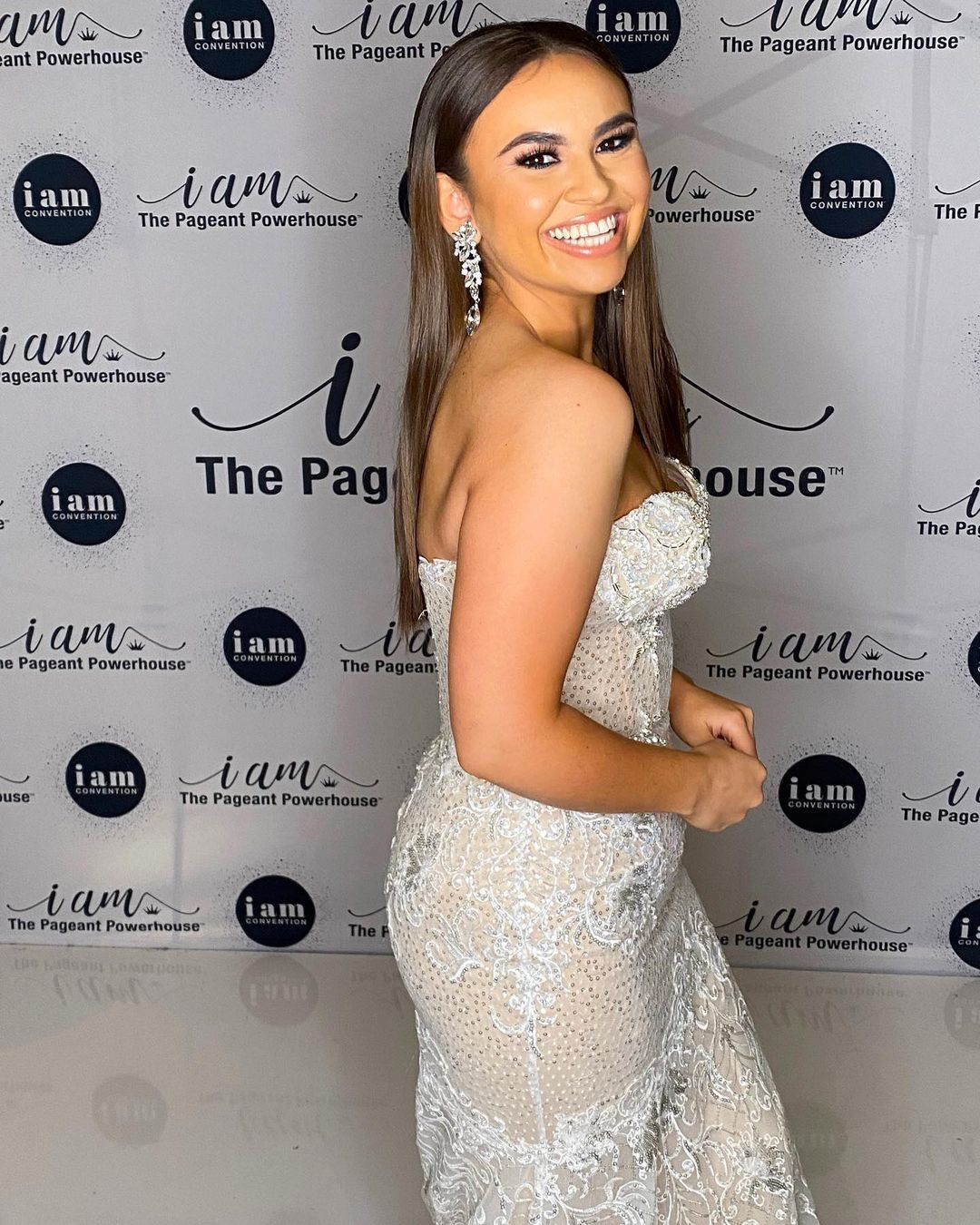Model wearing a lignt-gray gown