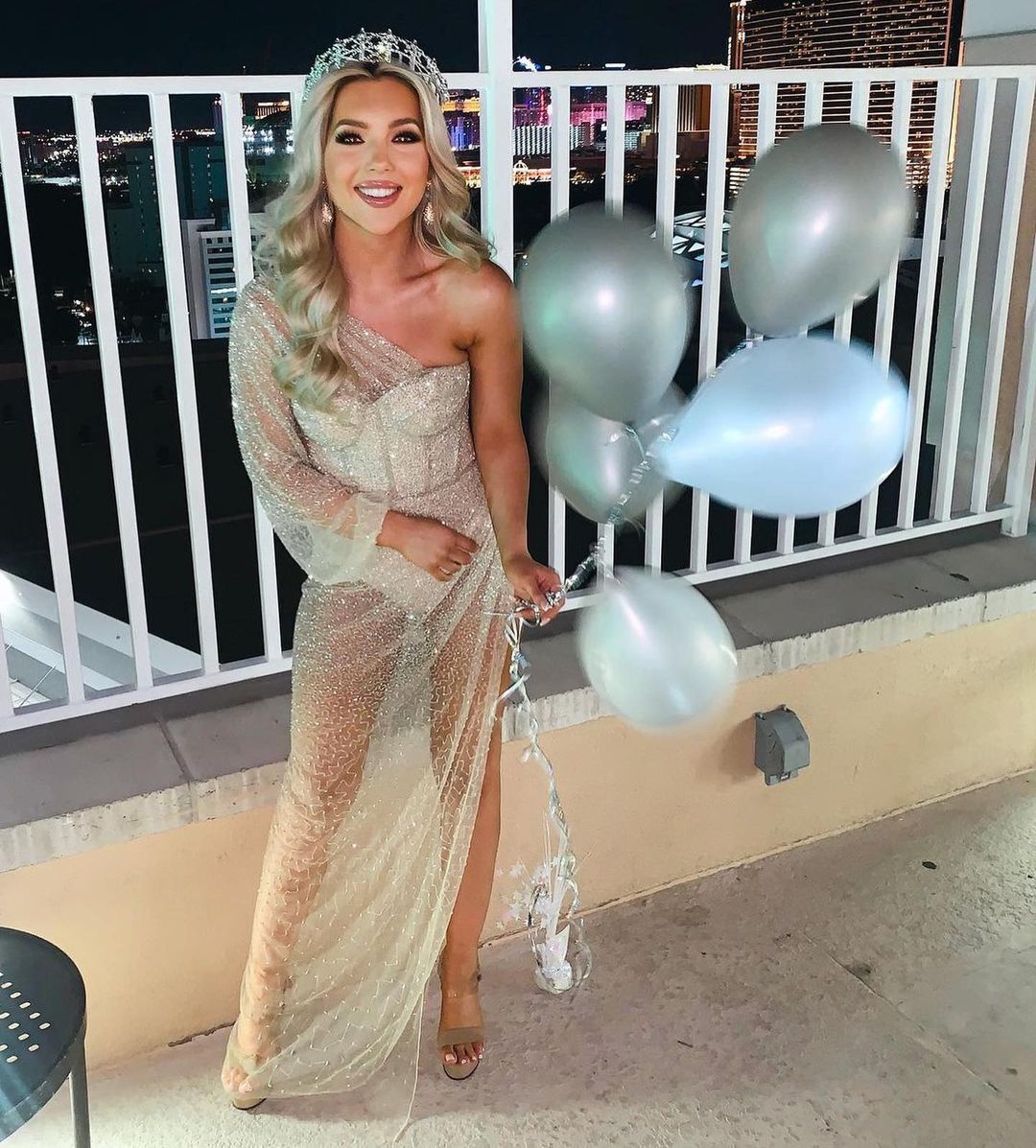 Model wearing a gray gown